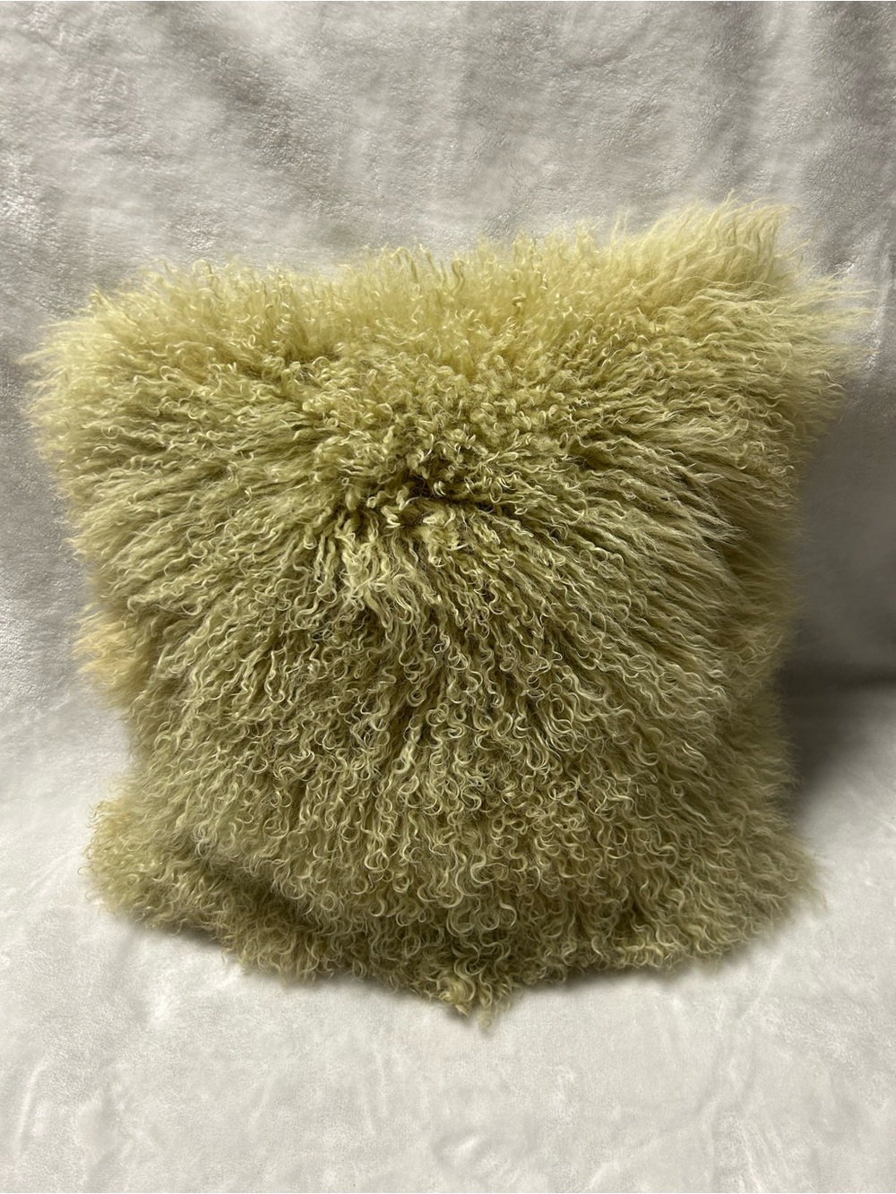Green West Elm Mongolian fur throw pillow 14.5 X 14.5